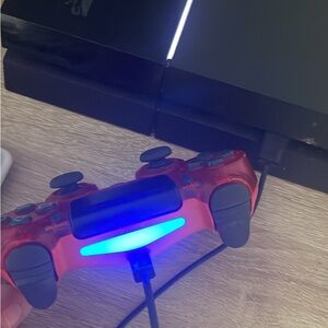 Sony PlayStation Console with Translucent Red Controller